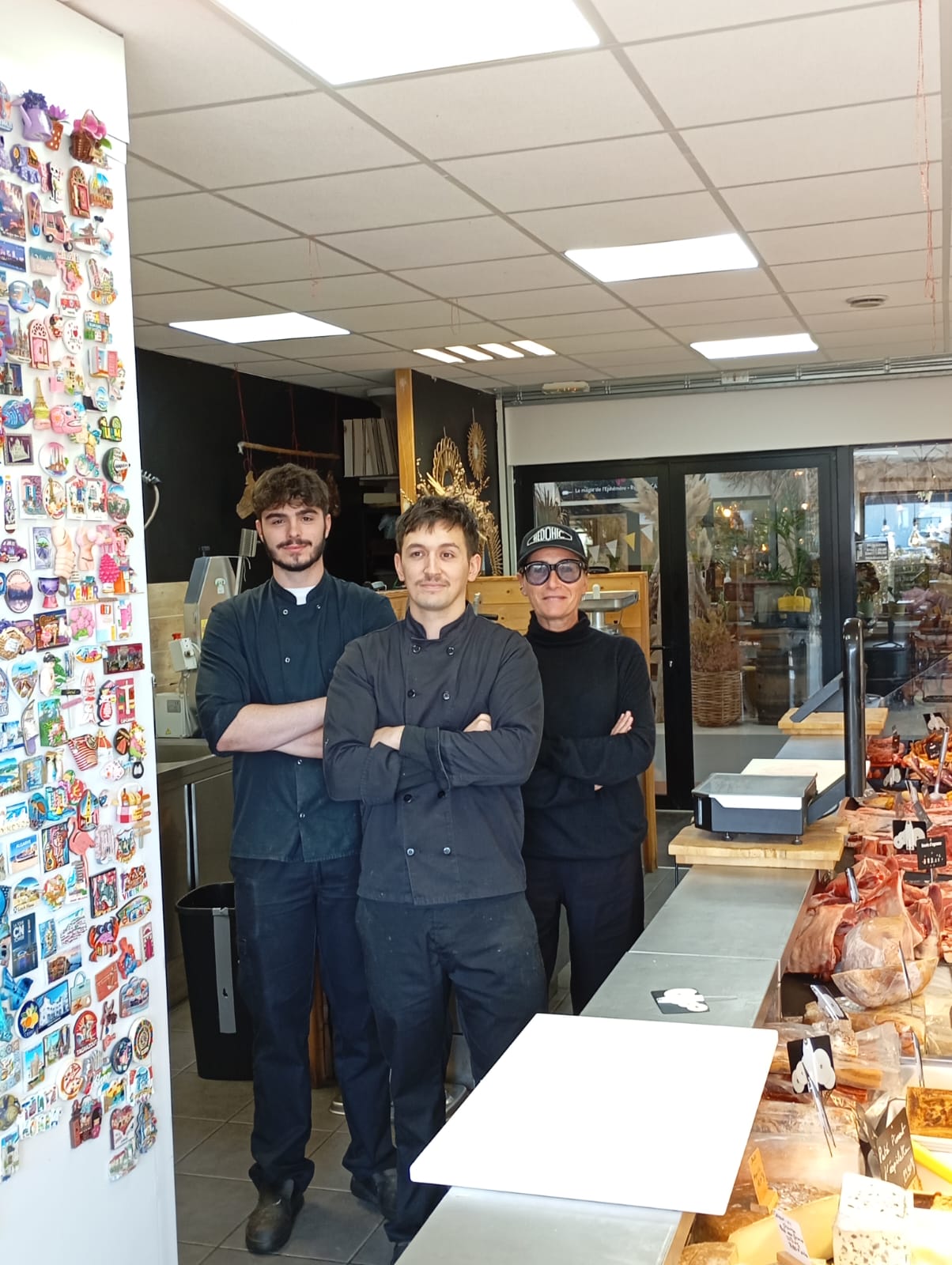 Marie-Pierre et ses deux associés dans la boucherie